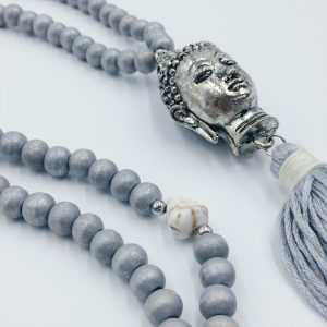 Perlenkette mit Buddha und Quaste